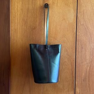 Building Block - black leather bag with tan leather on back of strap